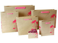 La poignée plate réutilisée Brown a adapté le cadeau de sacs en papier/sac de achat de papier d'emballage