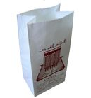 Le métier imprimé tiennent les sacs en papier adaptés aux besoins du client par blanc pour le pain/hamburger