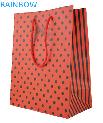 Le rouge a adapté le sac aux besoins du client de cadeau de Noël de sacs en papier avec la corde rouge/mignon imprimé