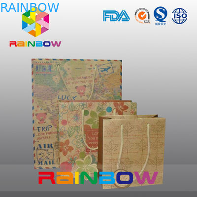 Sac de papier imprimé promotionnel de cadeau/sacs à provisions faits sur commande de papier de Noël pour des tissus