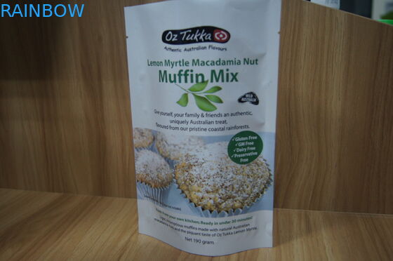 Vifs imprimés tiennent des biscuits de papier d'aluminium empaquetant le thermocollage supérieur de poches