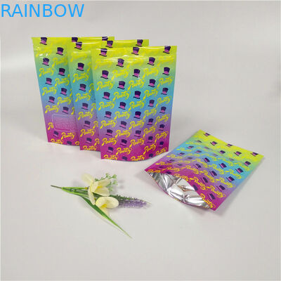 La double coutume de tirette a imprimé tiennent des poches a stratifié la surface brillante de sacs de papier d'aluminium