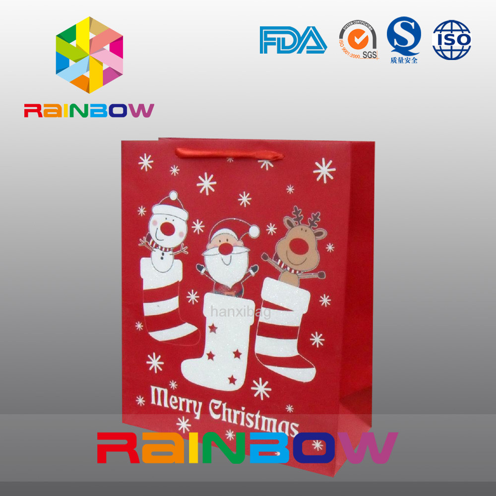 Le rouge a adapté le sac aux besoins du client de cadeau de Noël de sacs en papier avec la corde rouge/mignon imprimé