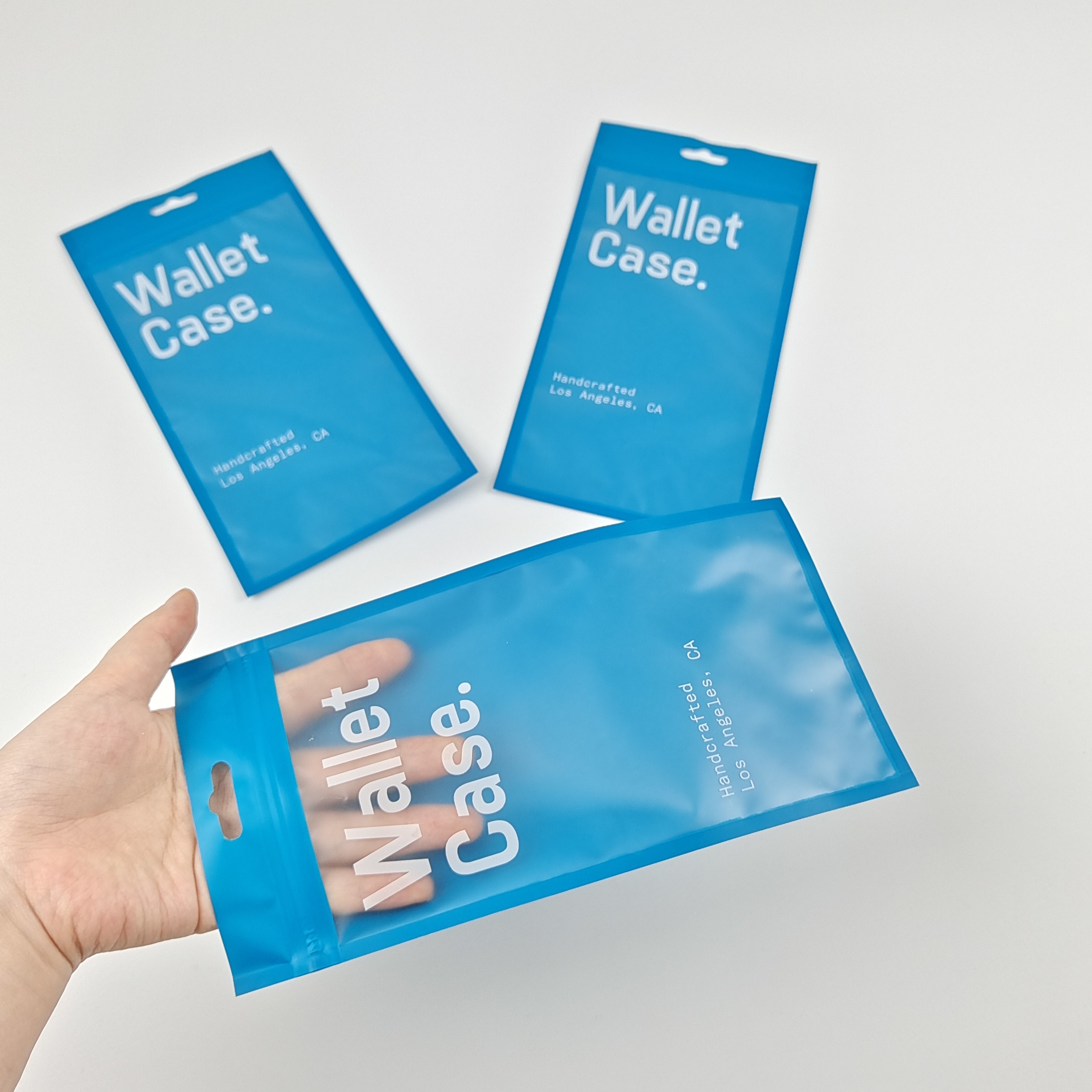 Boîtier de portefeuille plat boîtier de téléphone sacs d'emballage en plastique