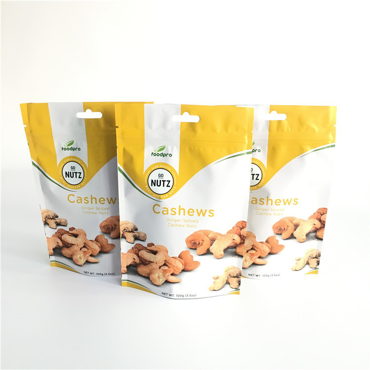 L'empaquetage fait sur commande de sachets en matière plastique d'impression tiennent le sac de tirette avec une valve de dégazage de manière