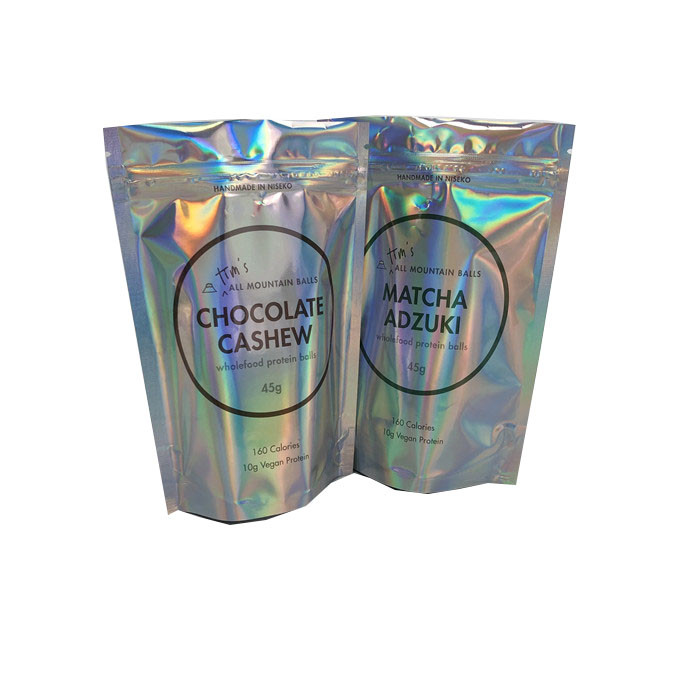 La tirette de CYMK olographe tiennent des poches pour des boules de protéine