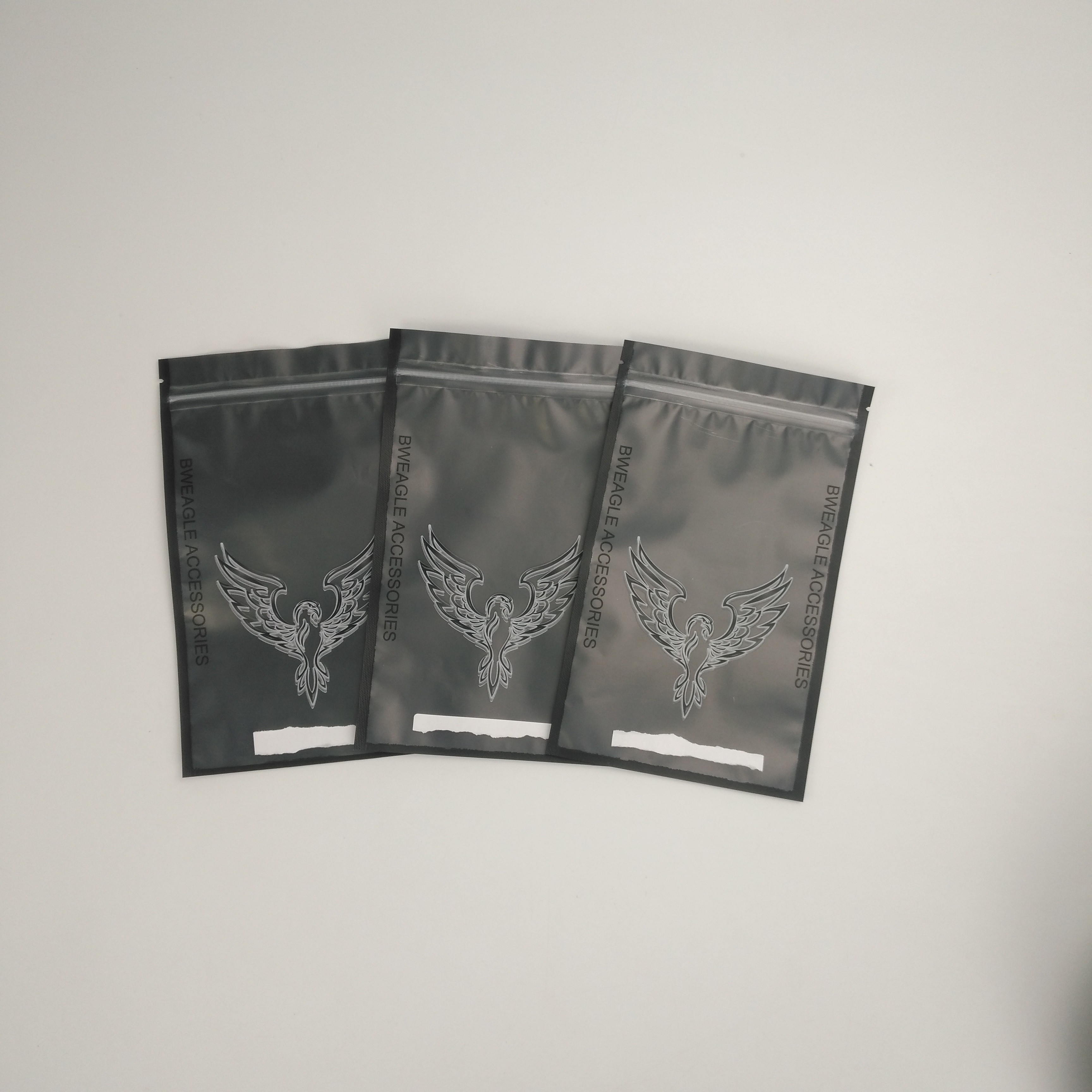 Accessoires brillants adaptés aux besoins du client d'écouteur empaquetant des casques d'écouteurs d'écouteurs de sac empaquetant des sacs avec le logo fait sur commande