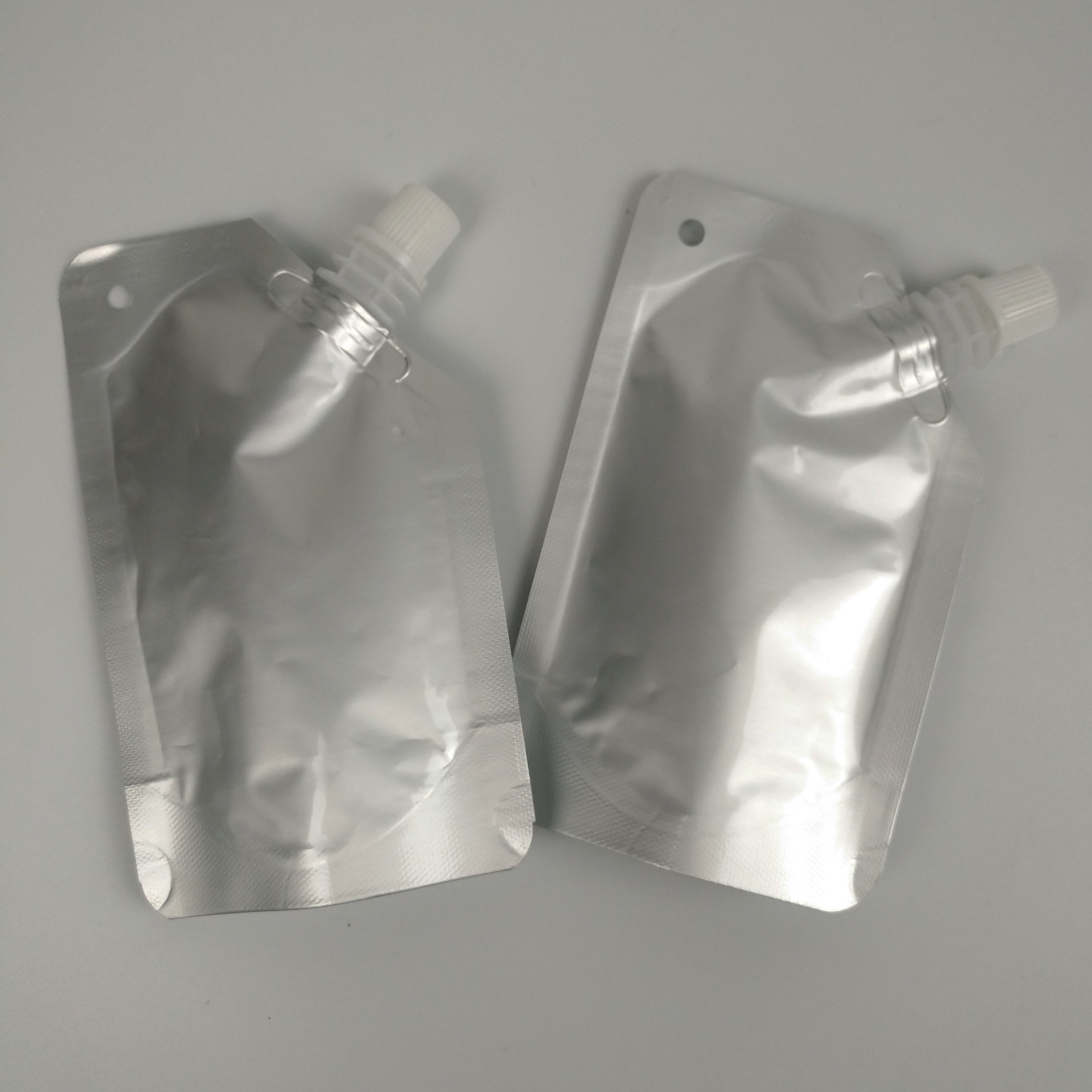 Support en aluminium de poche de bec vers le haut de l'huile essentielle empaquetant le sac de empaquetage liquide - sac jailli en aluminium de vin de Spouch de l'eau