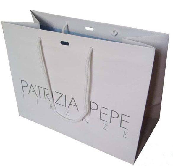 Grands sacs en papier adaptés aux besoins du client blancs de papier d'emballage avec le trou au centre